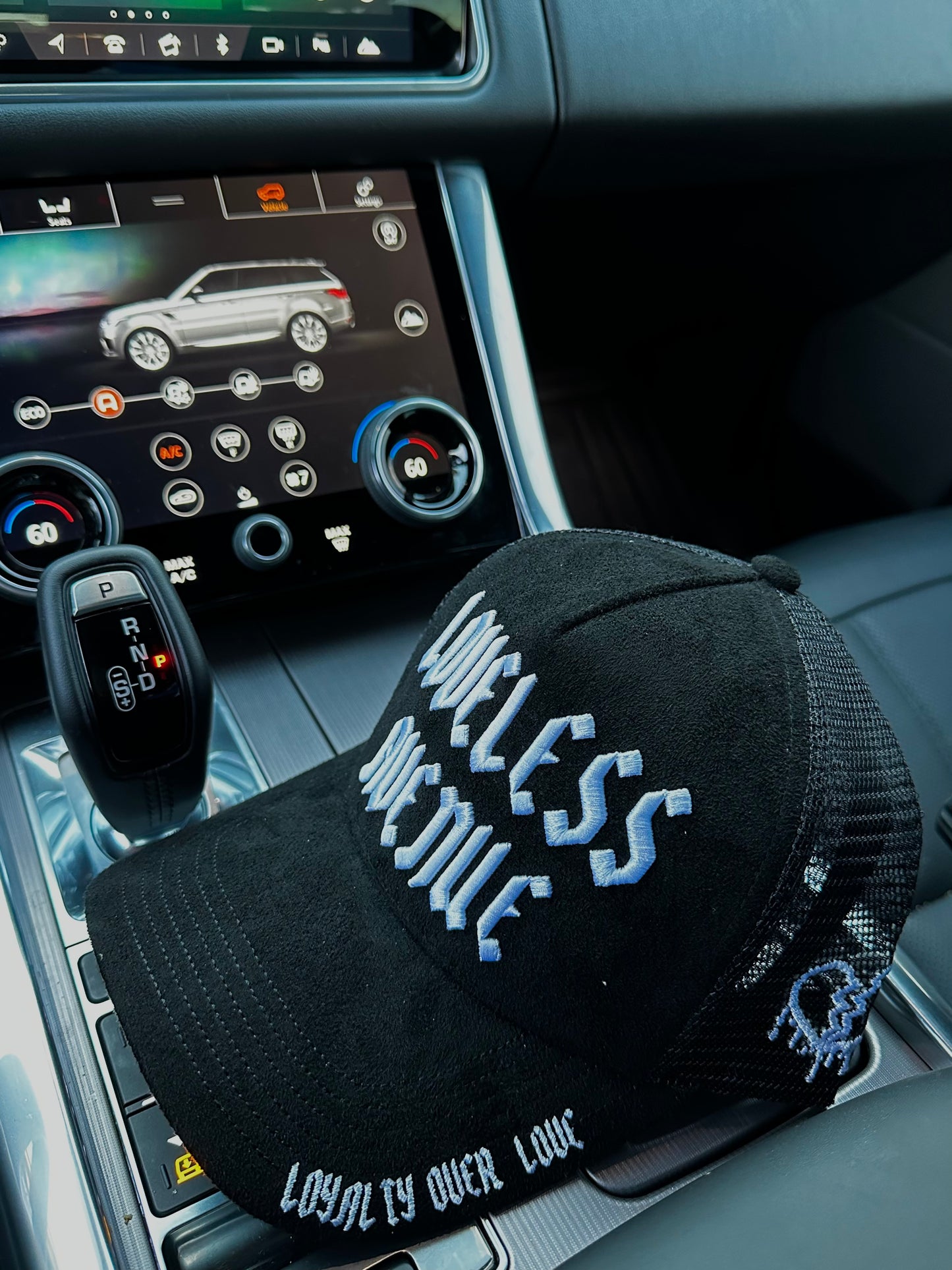 Black Loveless Avenue Trucker Hat