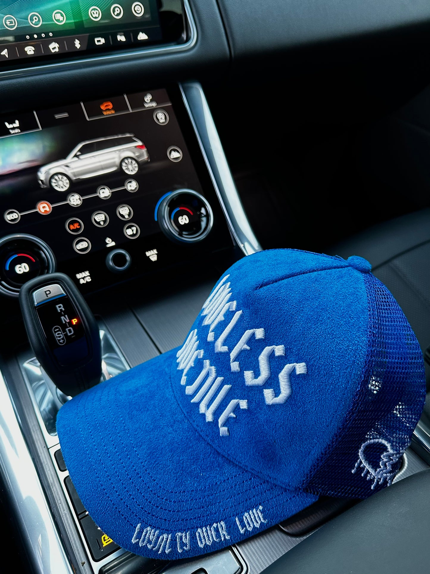 Blue Loveless Avenue Trucker Hat